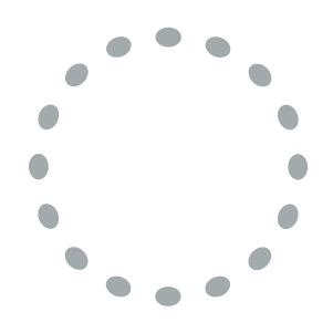 Room set up with chairs arranged in a circle in the middle of the room.