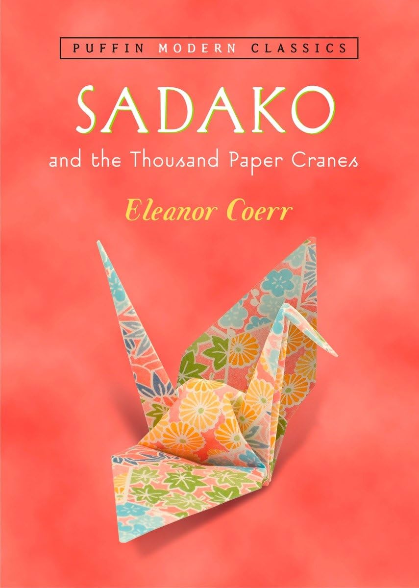 Colorful origami crane on a peach background