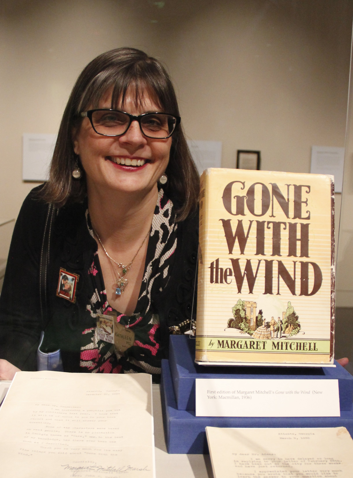 Kathleen Marcaccio with the book, Gone with the Wind by Margaret Mitchell